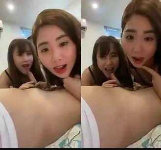 Hai em gai xinh tuoi cuoi phuc vu nhiet tinh cac anh khach trung
